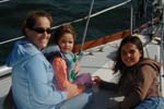 Theresa, Kiki, and Emily on the foredeck
